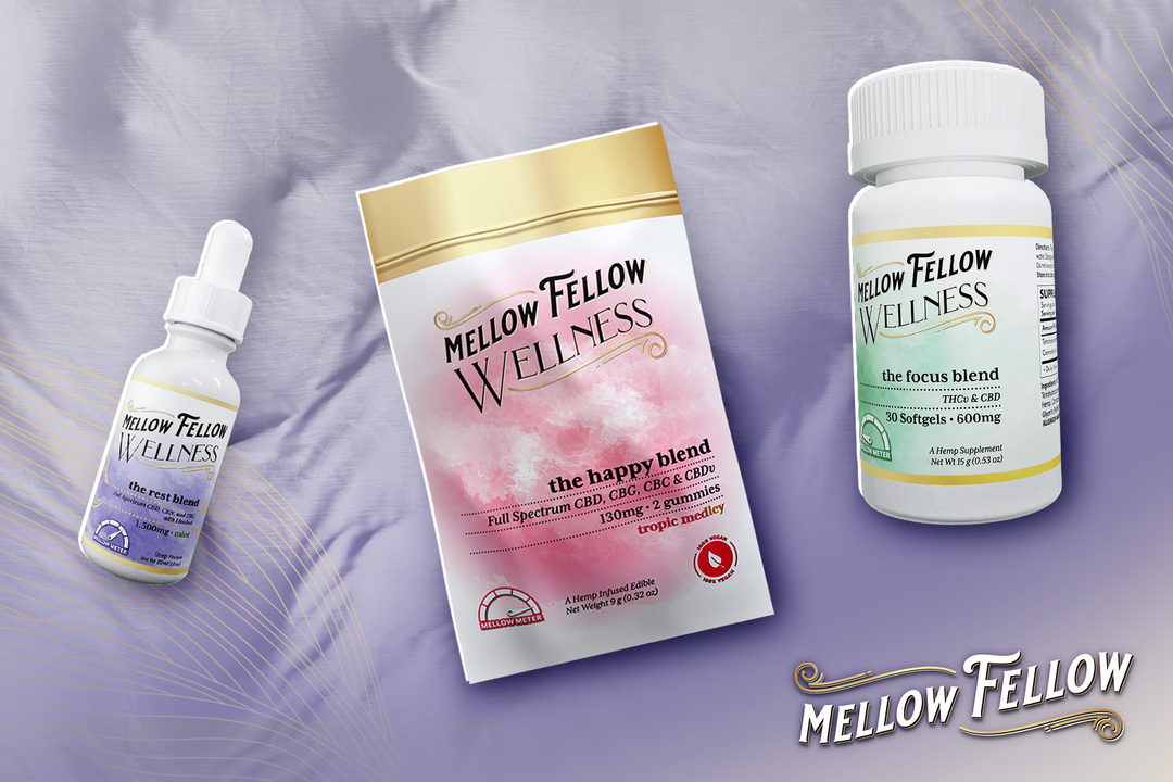 The Mellow Fellow WELLNESS The Rest Blend, The Happy Blend, and The Focus Blend are placed on a purple-colored cloth