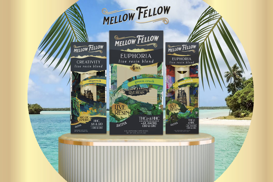 Assorted vape cartridges from Mellow Fellow with a picture of a beach behind them.