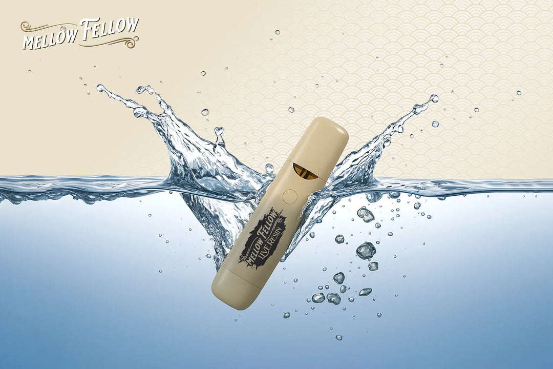 A Mellow Fellow Live Resin vape device splashes into water
