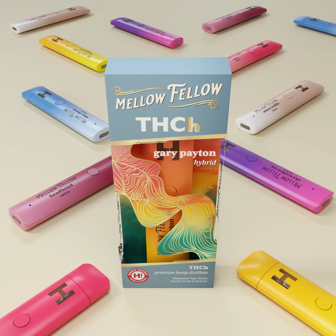 Colorful vape pens arranged in a circle around a Mellow Fellow THCh "Gary Payton" hybrid vape box, featuring wavy pastel designs and product information on the packaging.
