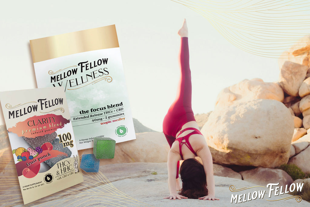 A woman is exercising on a mountain rock beside a pack of Mellow Fellow CLARITY Fruit Punch-flavored infused gummies and a container of WELLNESS The Focus Blend