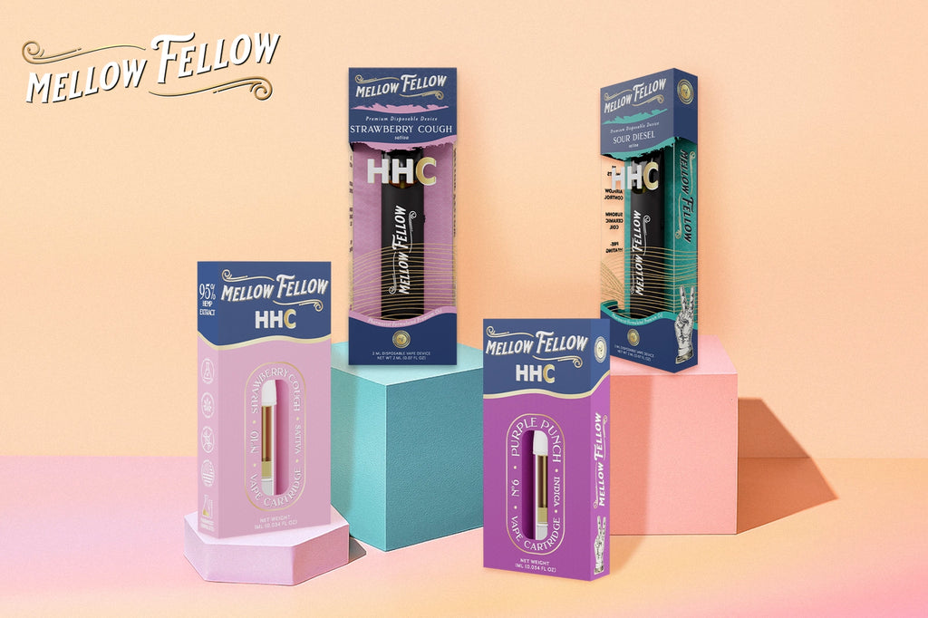 Two Mellow Fellow HHC vape devices and two vape cartridges in Strawberry Cough, Purple Punch, and Sour Diesel flavors placed on a podium