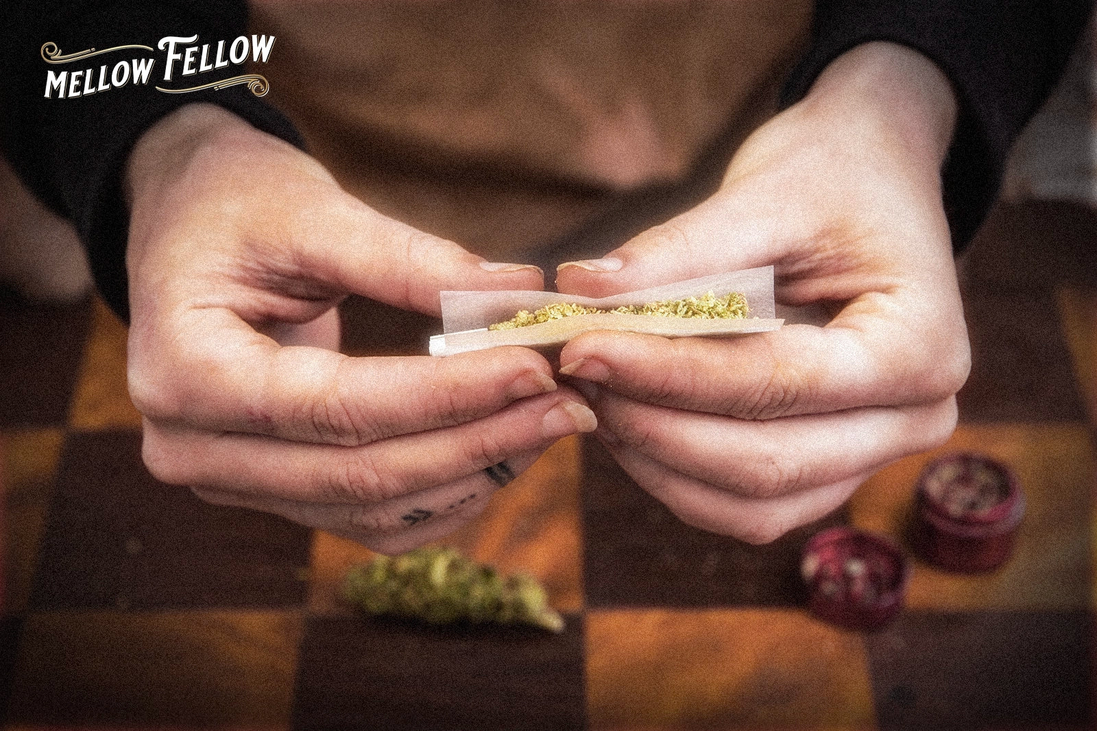 Hands Rolling a Joint